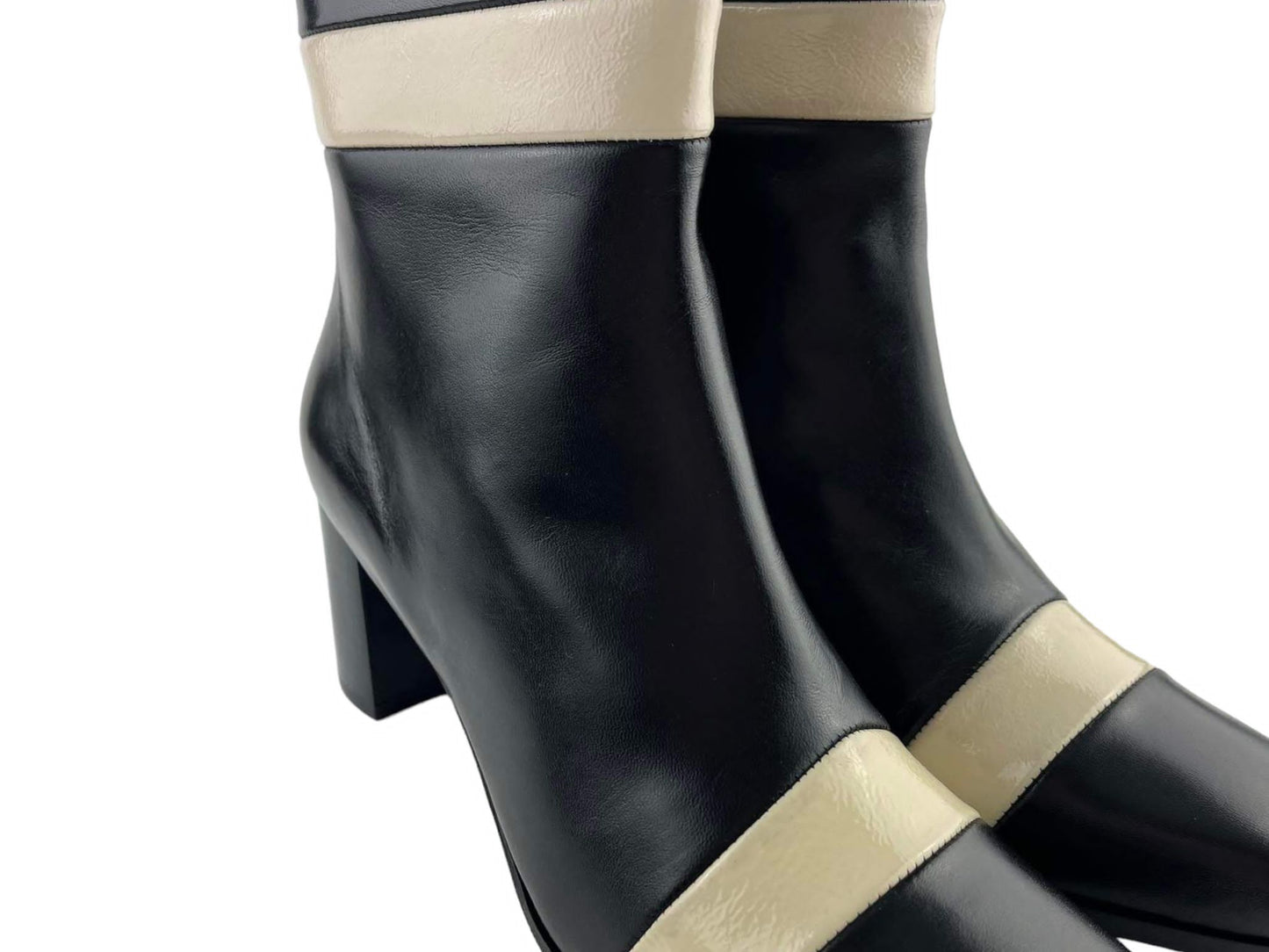 Plumers Menorca | Handmade black leather ankle boot with white stripes Addaya