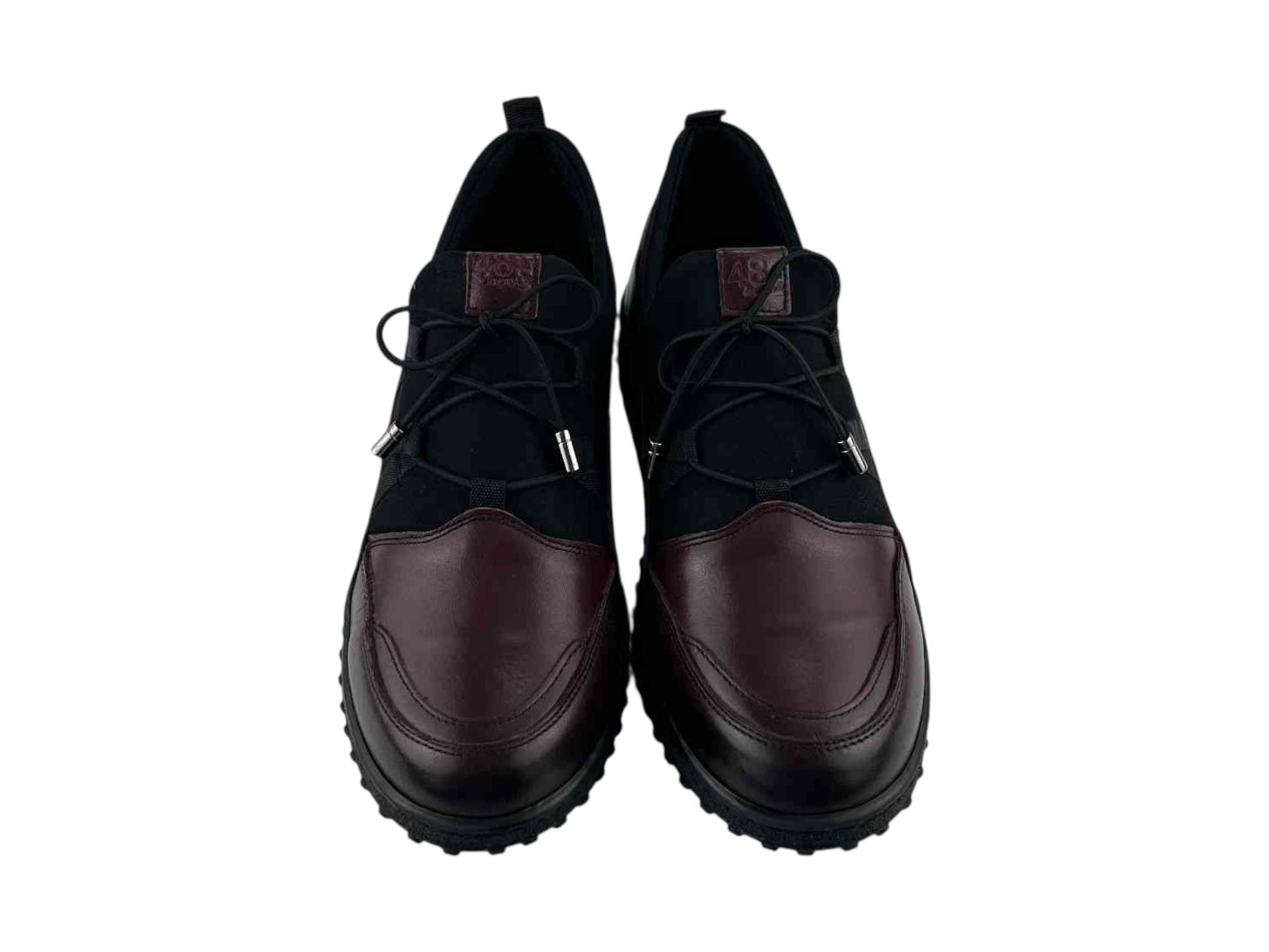 Zapatos planos de mujer en piel legítima, cómodos y en dos colores burdeos y elásticos en empeine en color negro.