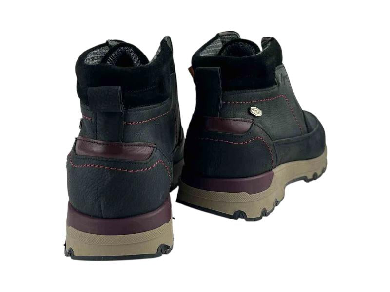 Botines negros de piel legítima de la marca Clayan en color negro, suela de goma y detalles en color púrpura. Botines cómodos y elegantes.