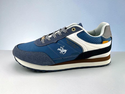 Zapatilla deportiva de la marca Beverly Hills Polo Club para hombre, confeccionada en tejido técnico transpirable azul con suela running bitono.
